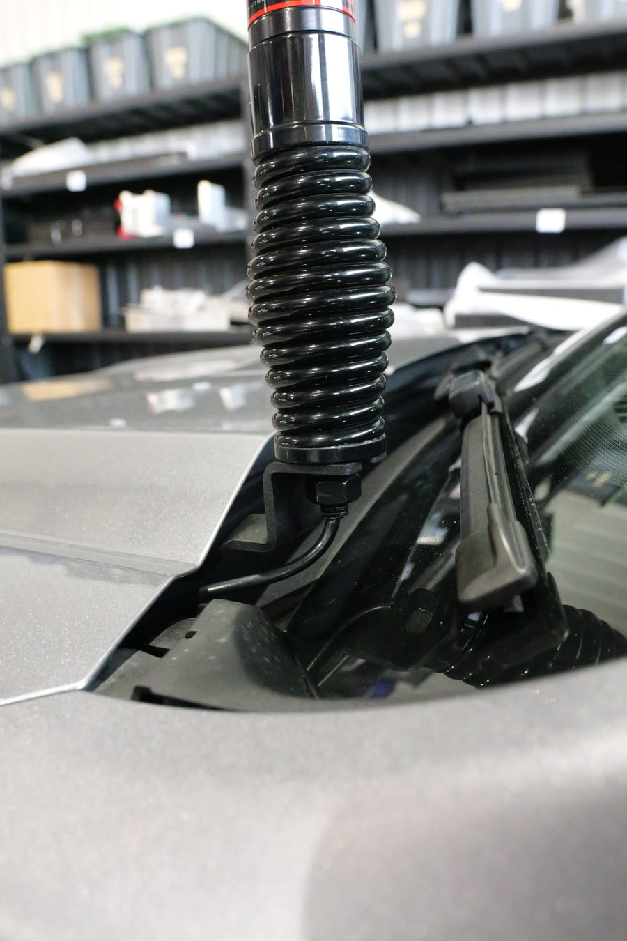 Bonnet-mounted UHF antenna bracket installed on a Ford Ranger Super Duty