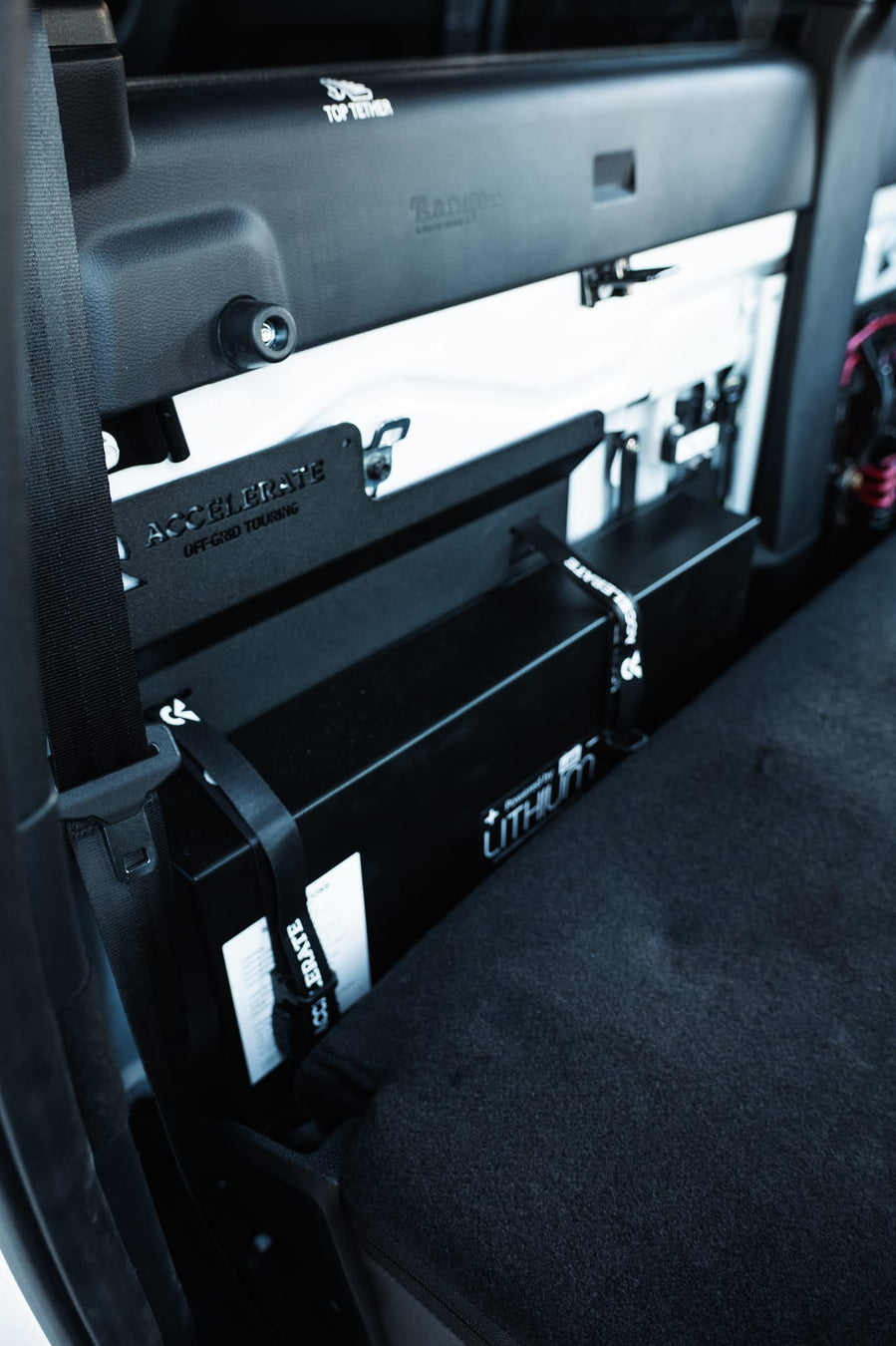 Ford Ranger Super Duty behind seat dual battery installation with lithium battery by Accelerate Off-Grid Touring